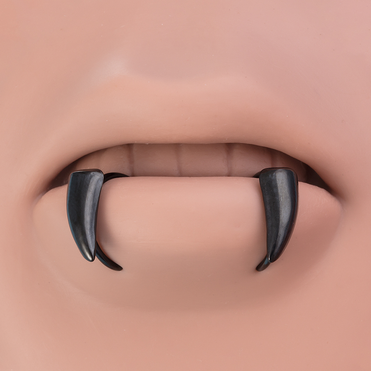 Wholesale of Stainless Steel Fang Fake Lip Ring Body Piercing Accessories