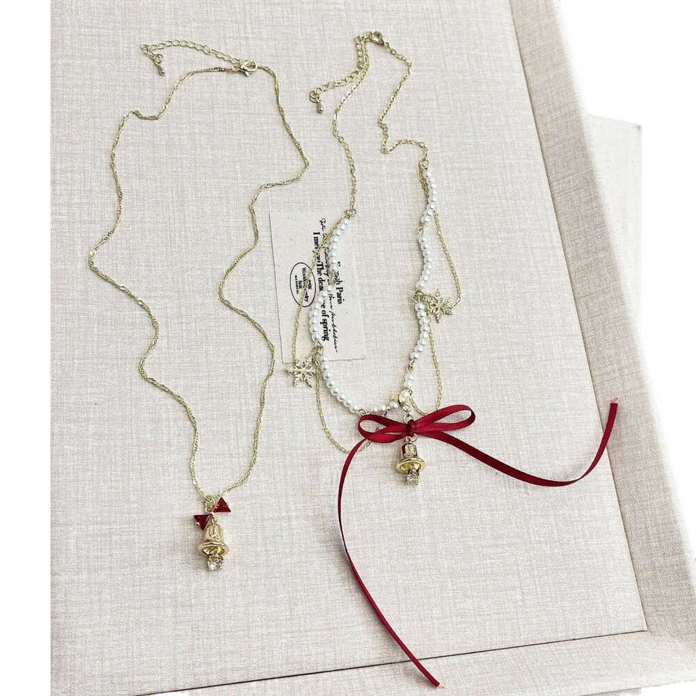 Streamer Bow Bell Pearl Necklace Autumn and Winter Unique Snowflake Tassel Collarbone High-End Neck Chain 78f