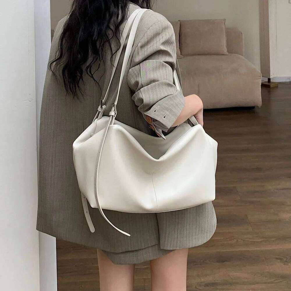 First layer cowhide shoulder 2025 new niche leather capacity lazy style high-end women's one-shoulder large tote bag