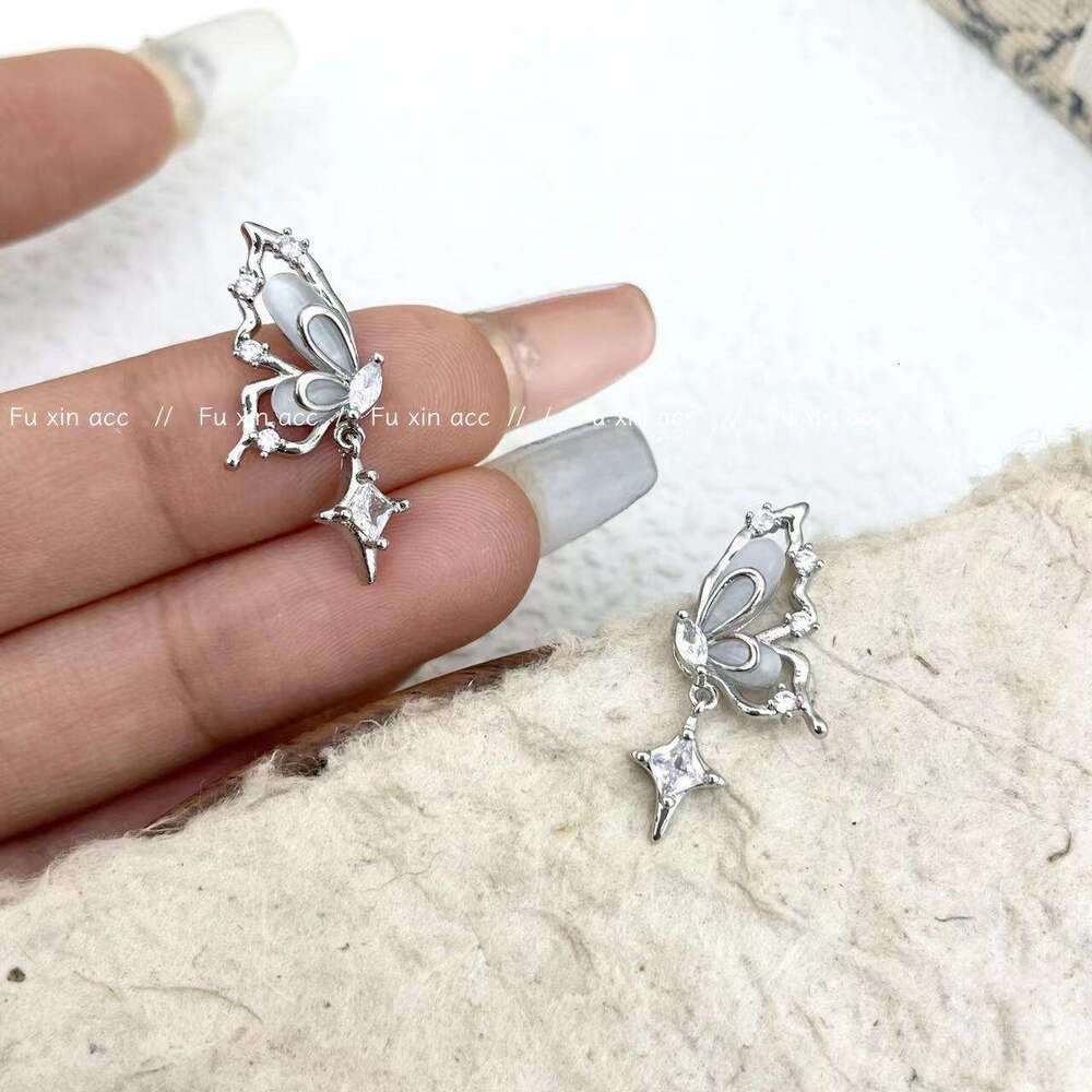 Spring Super Fairy Fantasy Butterfly Imitation Cat's Eye Stone Small and Exquisite Star Zircon Earrings Fashion Versatile Affordable Ear Jewelry 