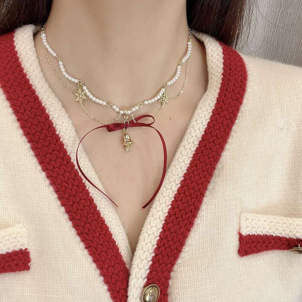 Streamer Bow Bell Pearl Necklace Autumn and Winter Unique Snowflake Tassel Collarbone High-End Neck Chain 78f
