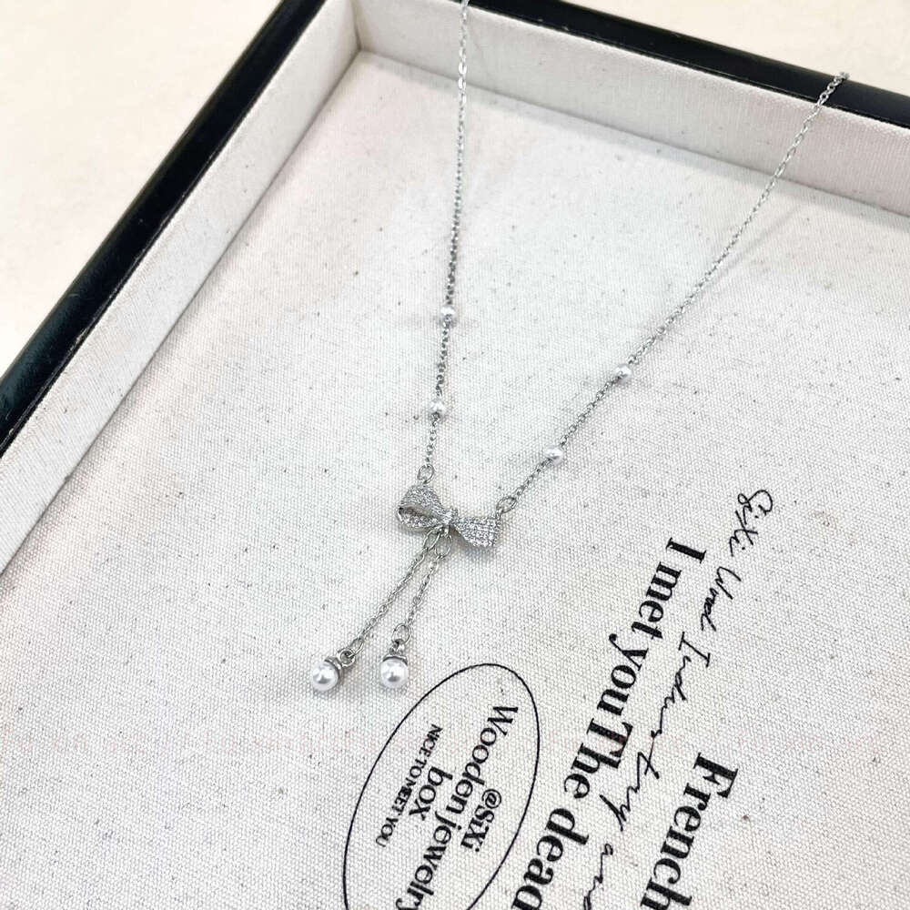 Pearl Bowknot Tassel Necklace for Women, Light Niche Design, Exquisite Simple Fashion, High-end Clavicle Chain 469