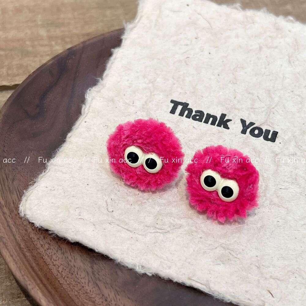 FX Ugly Cute Big Eye Pom Niche Minimalist Design Sense Playful Sweet Earrings Plush Ear Clips 22d