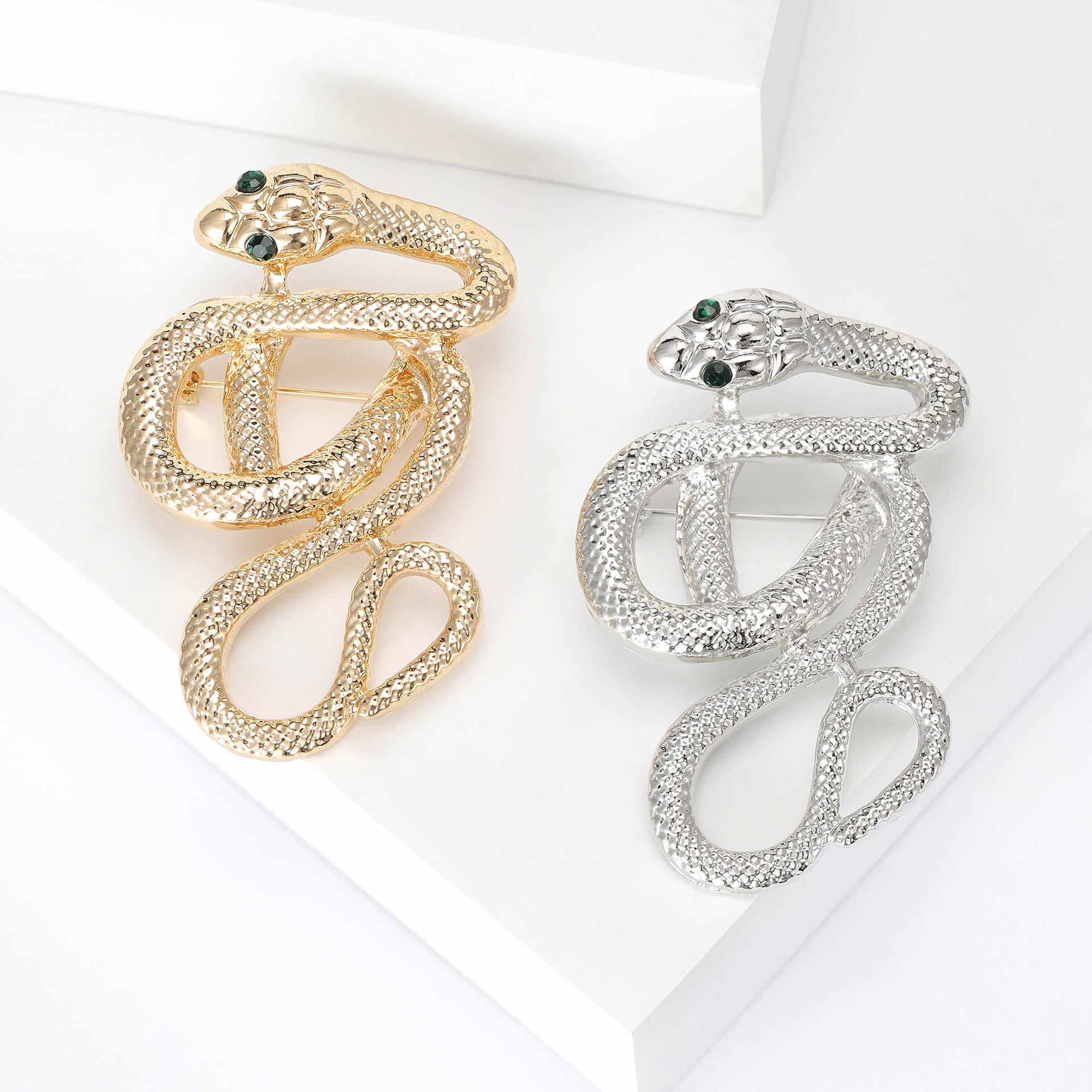 Silver Tone Textured Snake Brooch With Green Gemstone Eyes Elegant Party Jewelry And Gift For Her High Quality And Stylish Jewelry