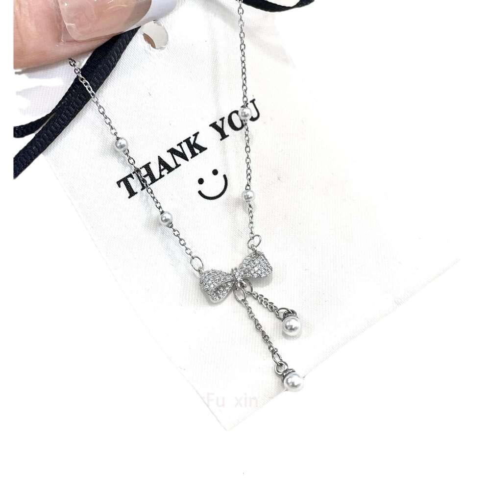 Pearl Bowknot Tassel Necklace for Women, Light Niche Design, Exquisite Simple Fashion, High-end Clavicle Chain 469