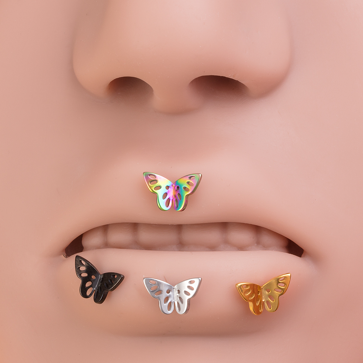 Stainless steel hollow three-dimensional butterfly lip studs, ear bone studs, earrings, body piercing accessories wholesale