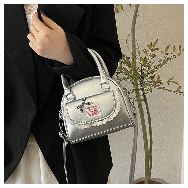 2025 Designer's New Cute Girl Design High end Boston Bag Women's Commuter Bag