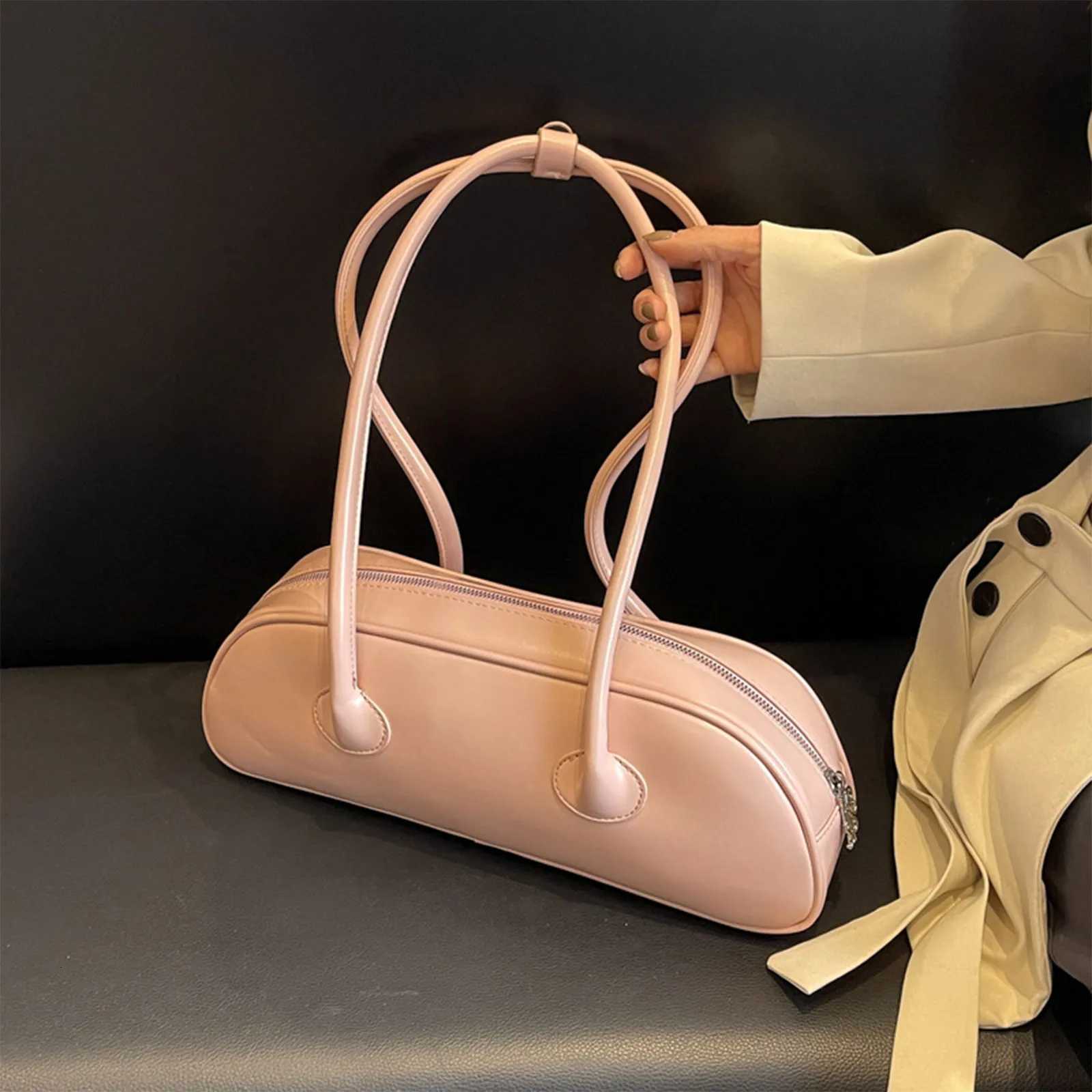 2025 New Leather Womens Light Baguette Shoulder Bag Simple Versatile Commuter Shopping Underarm Bag Y250729