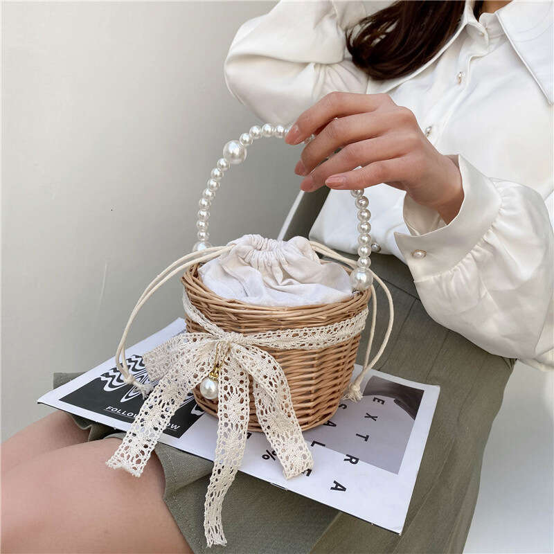 New Niche Design for Women 2023 Summer Trendy Woven Pearl Handheld Basket Bag