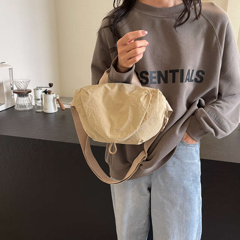 Simple Versatile Crossbody for Women 2025 New Casual Sports Style Niche Design Single Shoulder Dumpling Bag