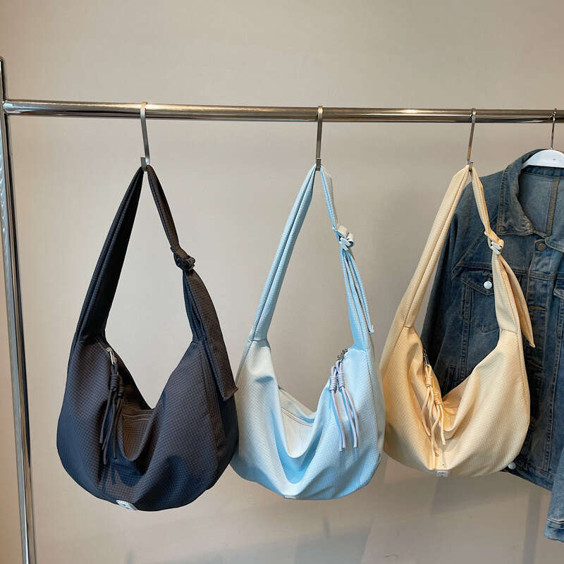 Korean Style Ins Super Popular Artistic Dumpling 2025 Summer New Daily Commuting Design Sense Fashion Crossbody Bag