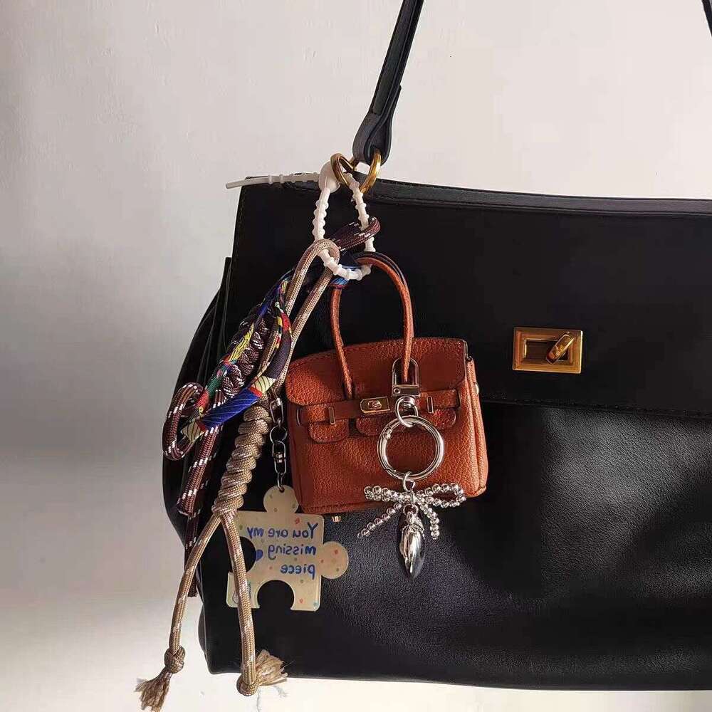 2024 New Minimalist REOO Versatile Bag Pendant Bia Matching Strap Fashionable Keychain
