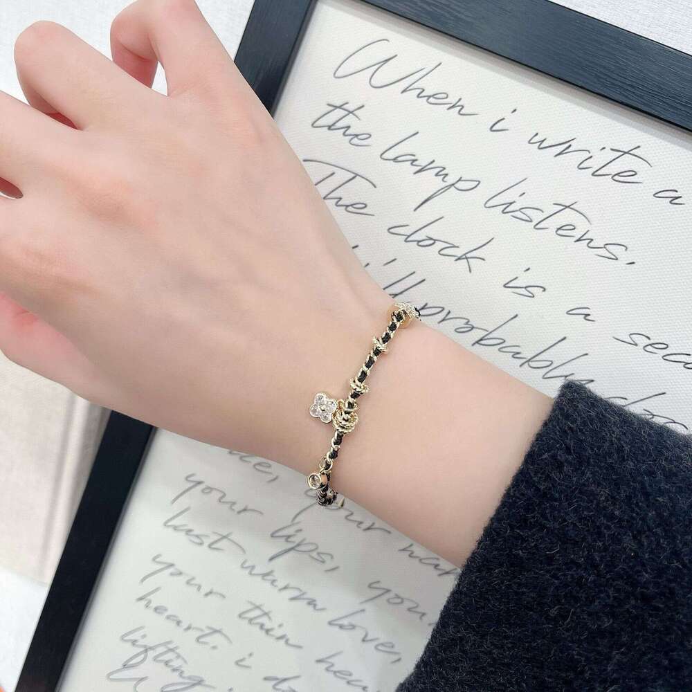 Xiaoxiangfeng Pointed Dia Four-Leaf Flower Black Gold Necklace for Women New Chinese Style Vintage Light Fashion High-End Braided Leather Rope 067