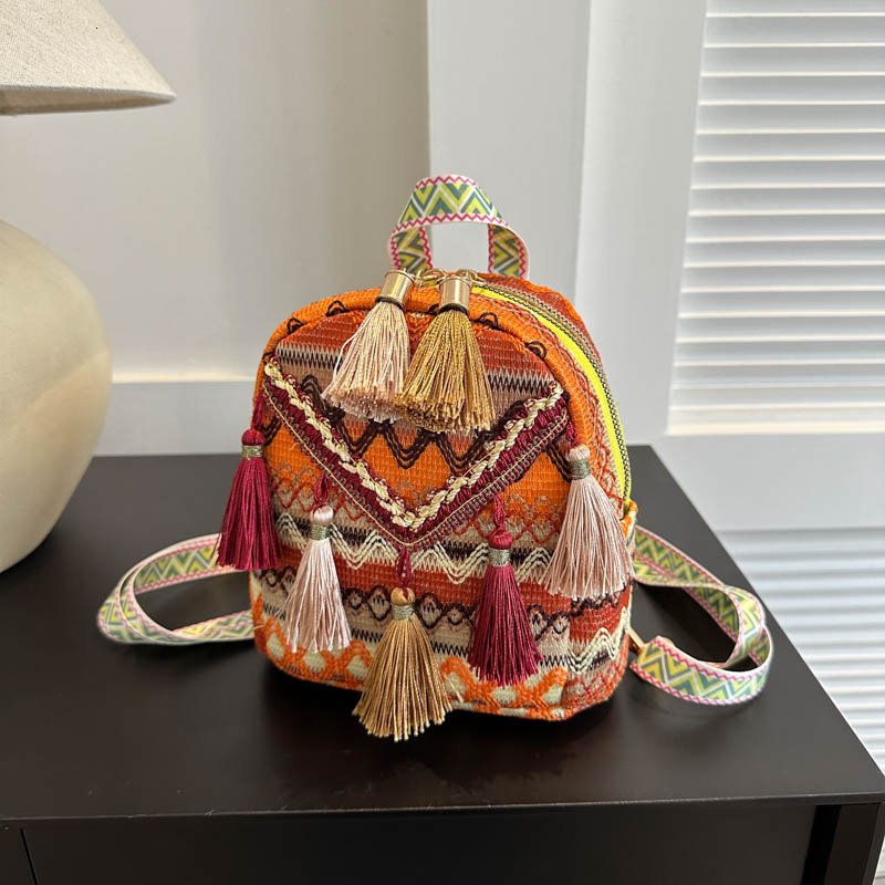New lightweight women's backpack Chinese ethnic style tassel crossbody bag outdoor travel fashion multifunctional small backpack designer bag