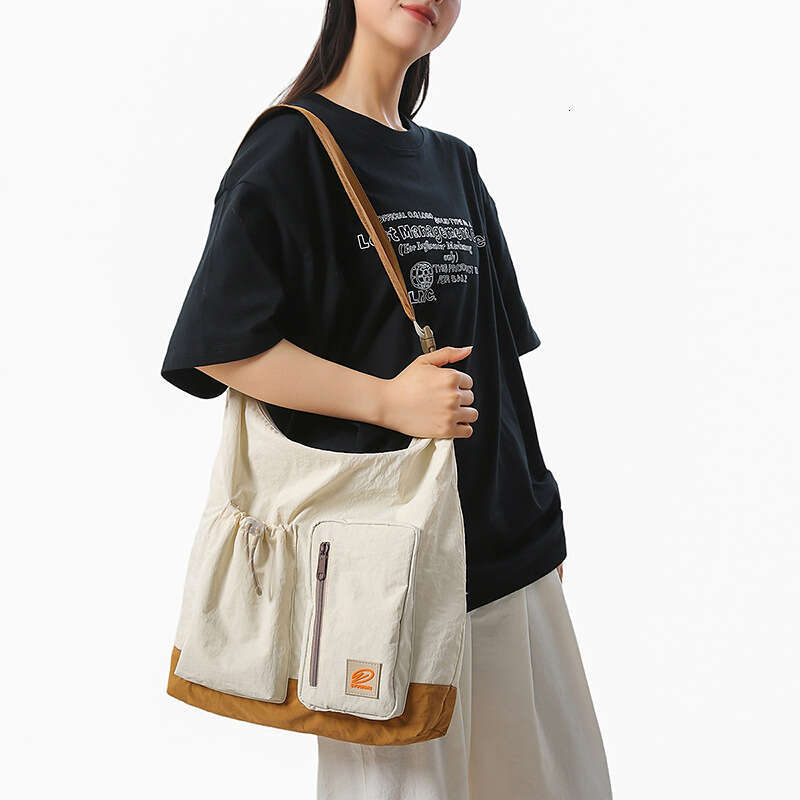 Spliced Nylon Large Capacity for Women, High-End Design Sense, Niche Single Shoulder Bag, Couple's Commuting Crossbody Bag