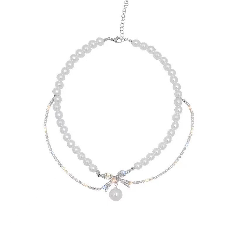 2025 Designer necklace Beach Lady Pendant New Hot-Selling High-End Bowknot Heart Collarbone Chain Light Luxury Niche Evening Dress Necklace Accessorie