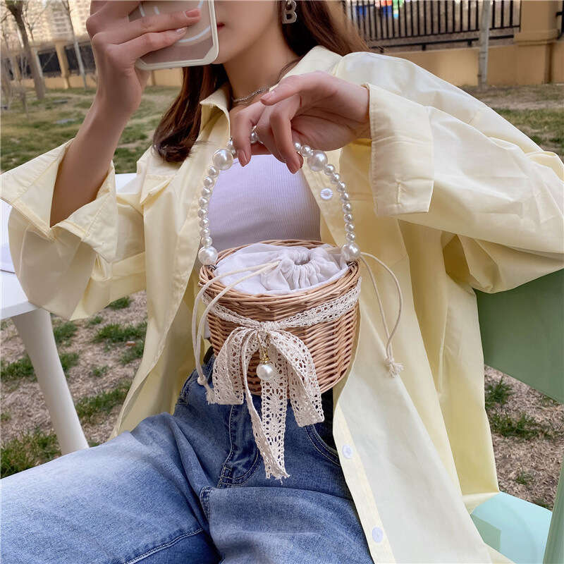 New Niche Design for Women 2023 Summer Trendy Woven Pearl Handheld Basket Bag
