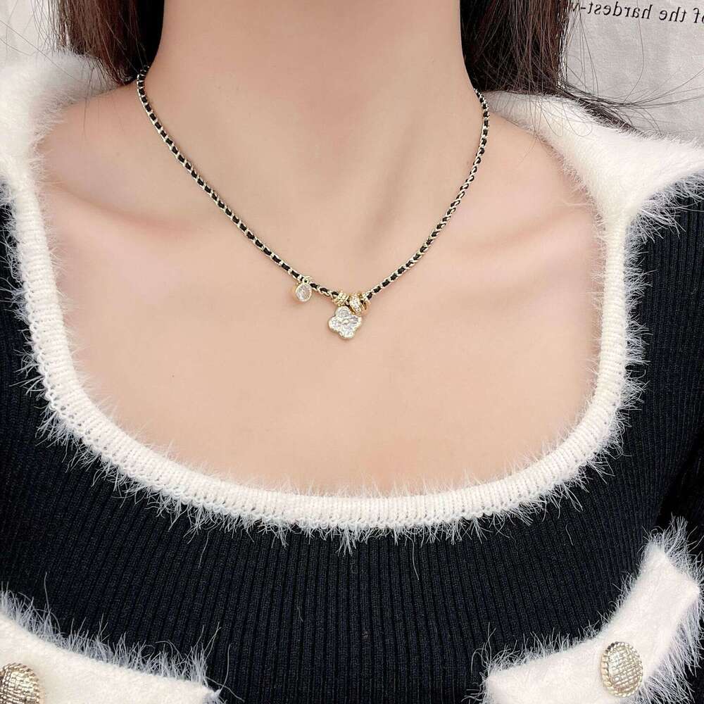 Xiaoxiangfeng Pointed Dia Four-Leaf Flower Black Gold Necklace for Women New Chinese Style Vintage Light Fashion High-End Braided Leather Rope 067