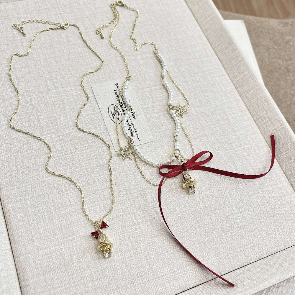 Streamer Bow Bell Pearl Necklace Autumn and Winter Unique Snowflake Tassel Collarbone High-End Neck Chain 78f