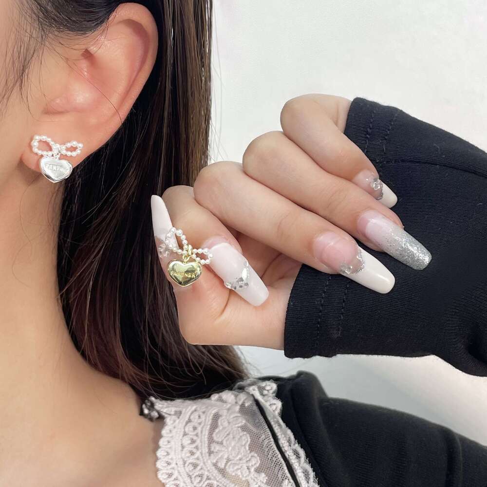 Korean Style New Elegant Pearl Bowknot Metal Feel Exquisite Heart Earrings Light Fashion Versatile Ear Jewelry dd5