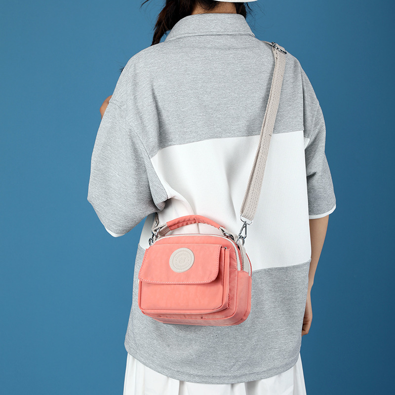 New Women's Fashion Trend Crossbody Simple Water-Resistant Bag Lipstick Coin Portable Handbag ddmymoon