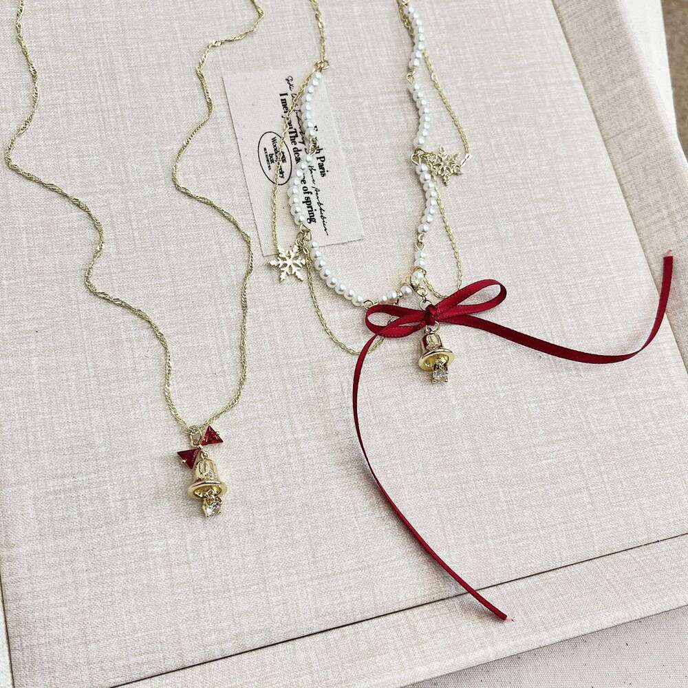 Streamer Bow Bell Pearl Necklace Autumn and Winter Unique Snowflake Tassel Collarbone High-End Neck Chain 78f