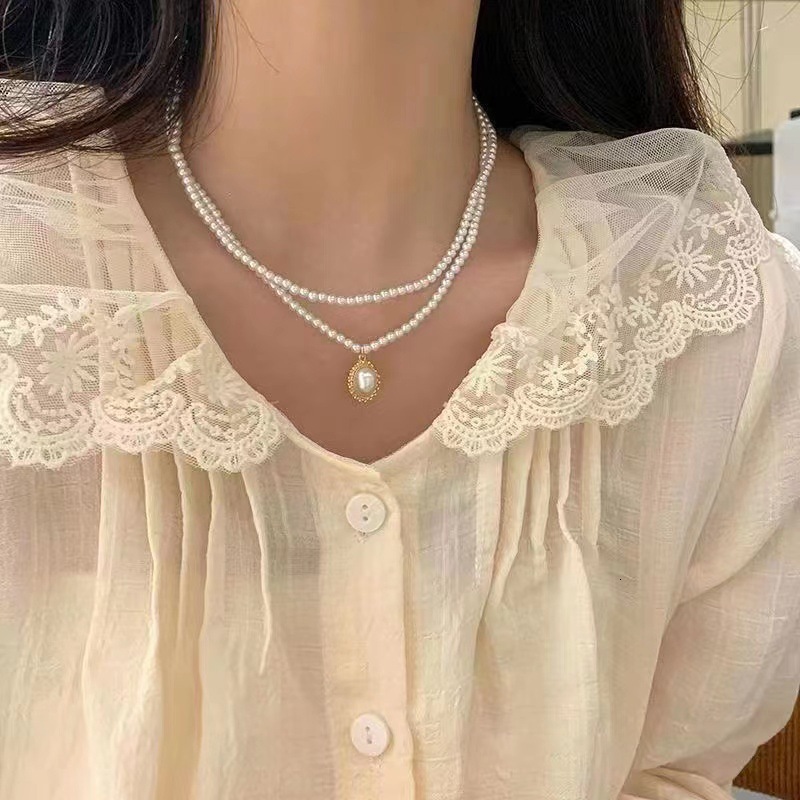 2025 Designer necklace Beach Lady Pendant New Hot-Selling High-End Bowknot Heart Collarbone Chain Light Luxury Niche Evening Dress Necklace Accessorie