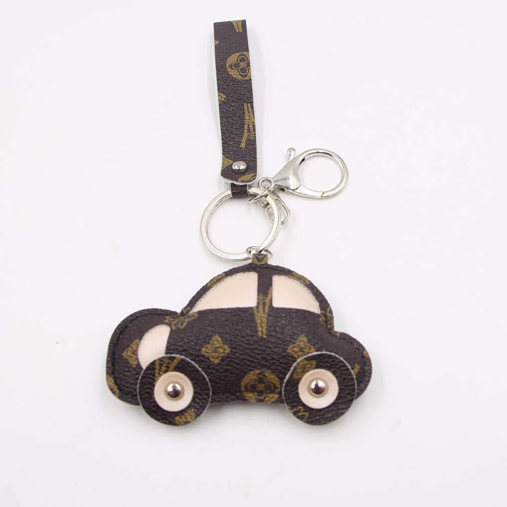 Elegant 'Sweet Style' PU Leather Badge Keychain with a Cute Vehicle Design by Zuge