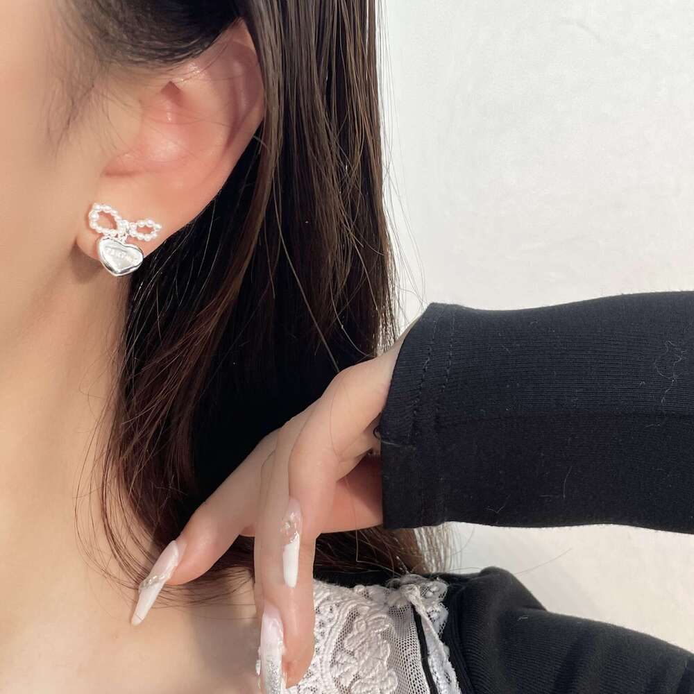 Korean Style New Elegant Pearl Bowknot Metal Feel Exquisite Heart Earrings Light Fashion Versatile Ear Jewelry dd5