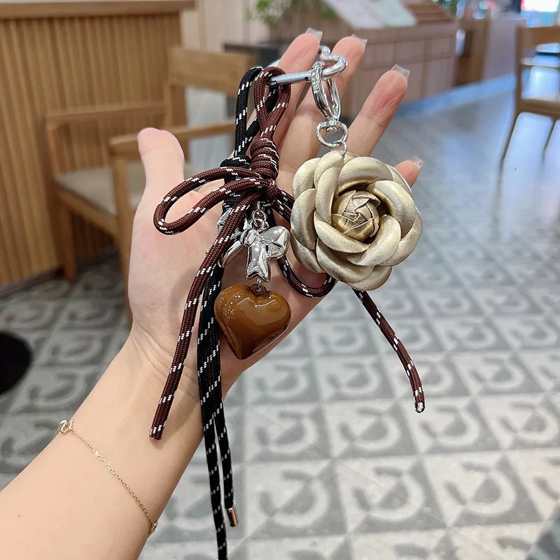 Trendy style camellia flower Backpack pendant Hand woven rope Hangings love heartKey Chain 250729