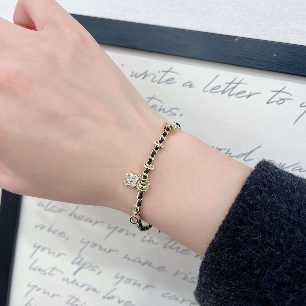 Xiaoxiangfeng Pointed Dia Four-Leaf Flower Black Gold Necklace for Women New Chinese Style Vintage Light Fashion High-End Braided Leather Rope 067