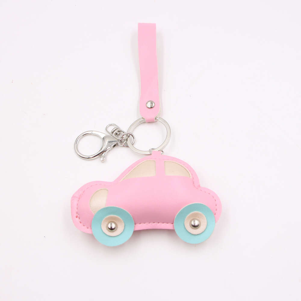 Elegant 'Sweet Style' PU Leather Badge Keychain with a Cute Vehicle Design by Zuge