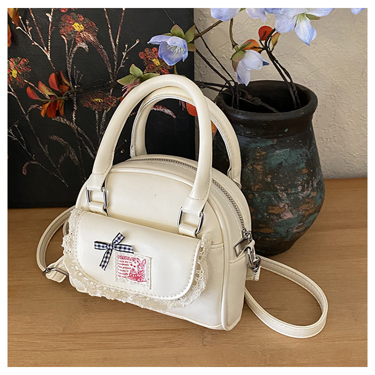 2025 Designer's New Cute Girl Design High end Boston Bag Women's Commuter Bag