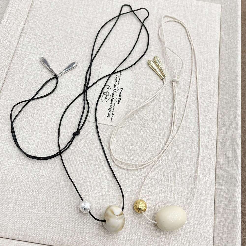 Niche Design Emotion Pendant for Women 24 New Style Tie Rope Long Sweater Chain Versatile Fashionable Simple Necklace 701