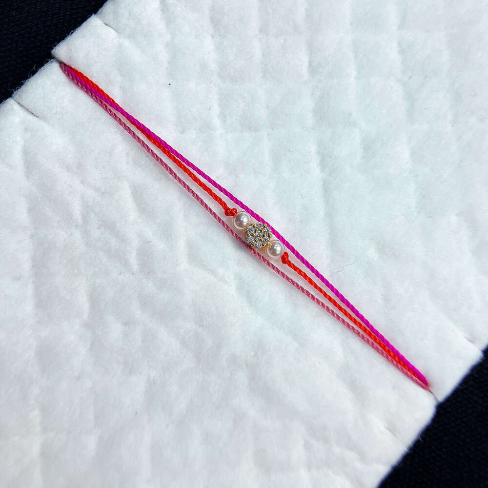 French Paris Fashion New Pearl Small Flower Inlaid Dia Three-Layer Woven Women's Bracelet Zodiac Year Lucky Trend