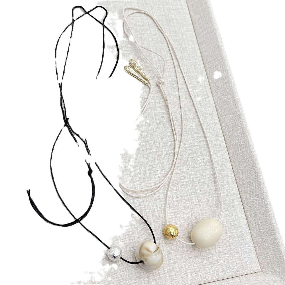 Niche Design Emotion Pendant for Women 24 New Style Tie Rope Long Sweater Chain Versatile Fashionable Simple Necklace 701