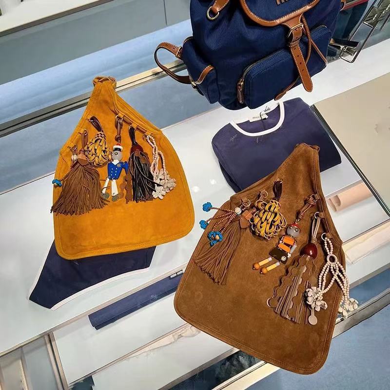 New womens bag suede suede crossbody bag genuine leather handbag for women doll pendant handbag tassel shoulder bag