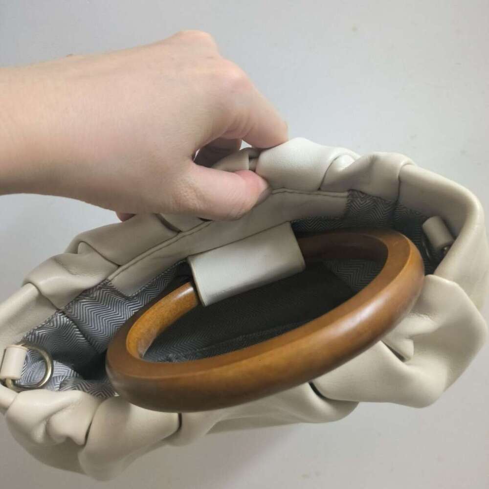 Niche Design Wooden Handle Wrinkled Cloud Handbag for Women 2025 New Ins Style Crossbody Mini Bag Trendy