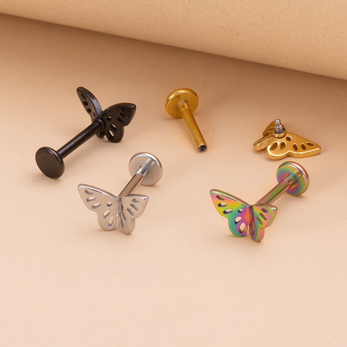 Stainless steel hollow three-dimensional butterfly lip studs, ear bone studs, earrings, body piercing accessories wholesale