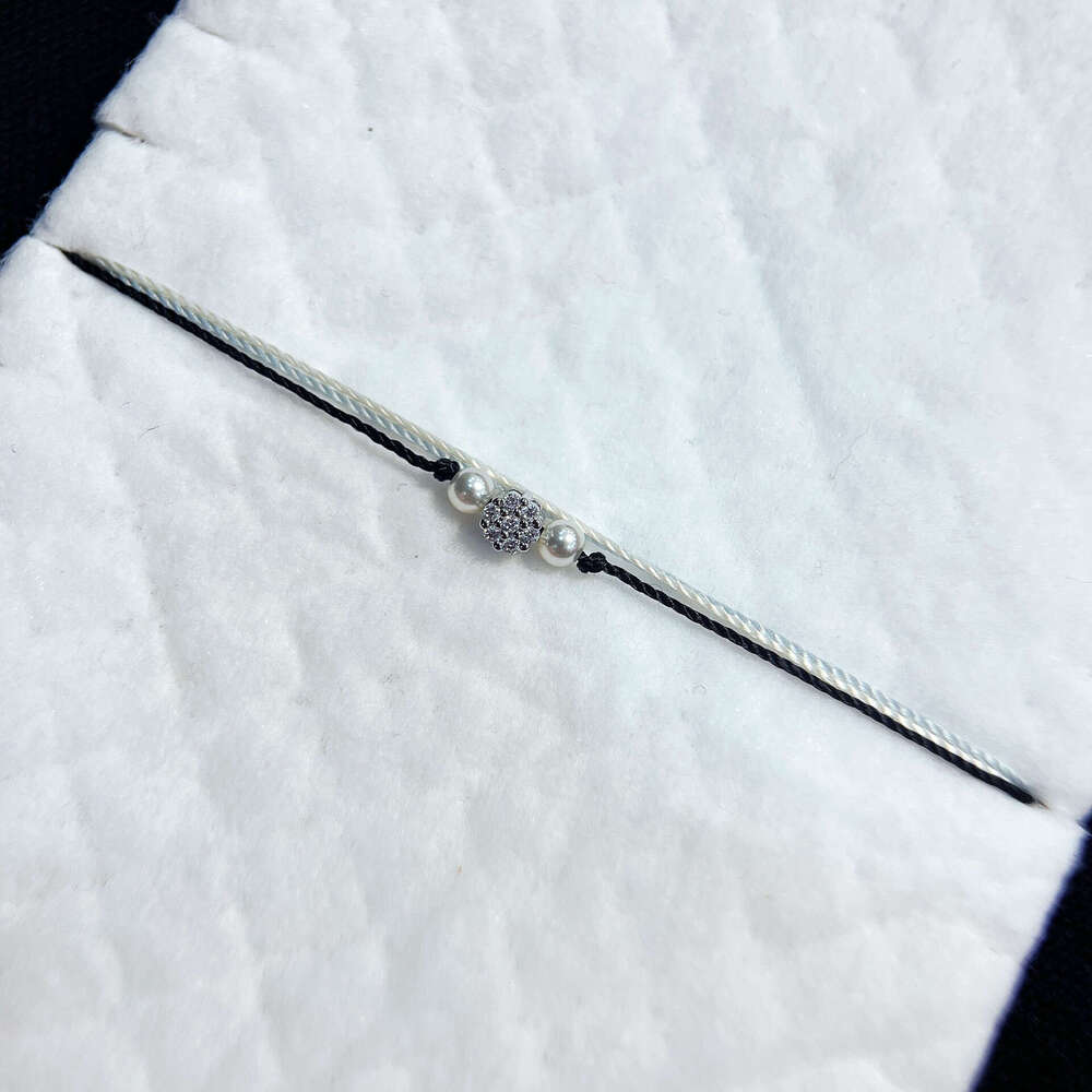 French Paris Fashion New Pearl Small Flower Inlaid Dia Three-Layer Woven Women's Bracelet Zodiac Year Lucky Trend