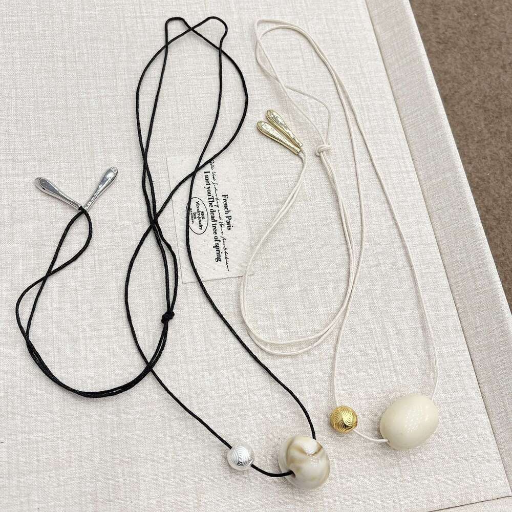 Niche Design Emotion Pendant for Women 24 New Style Tie Rope Long Sweater Chain Versatile Fashionable Simple Necklace 701