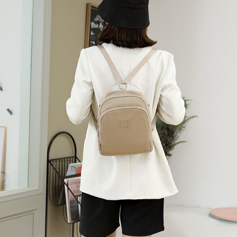 2025 New Multifunctional Backpack Waterproof Nylon Women's Shoulder Large Capacity Commuter Crossbody Bag ddmymoon