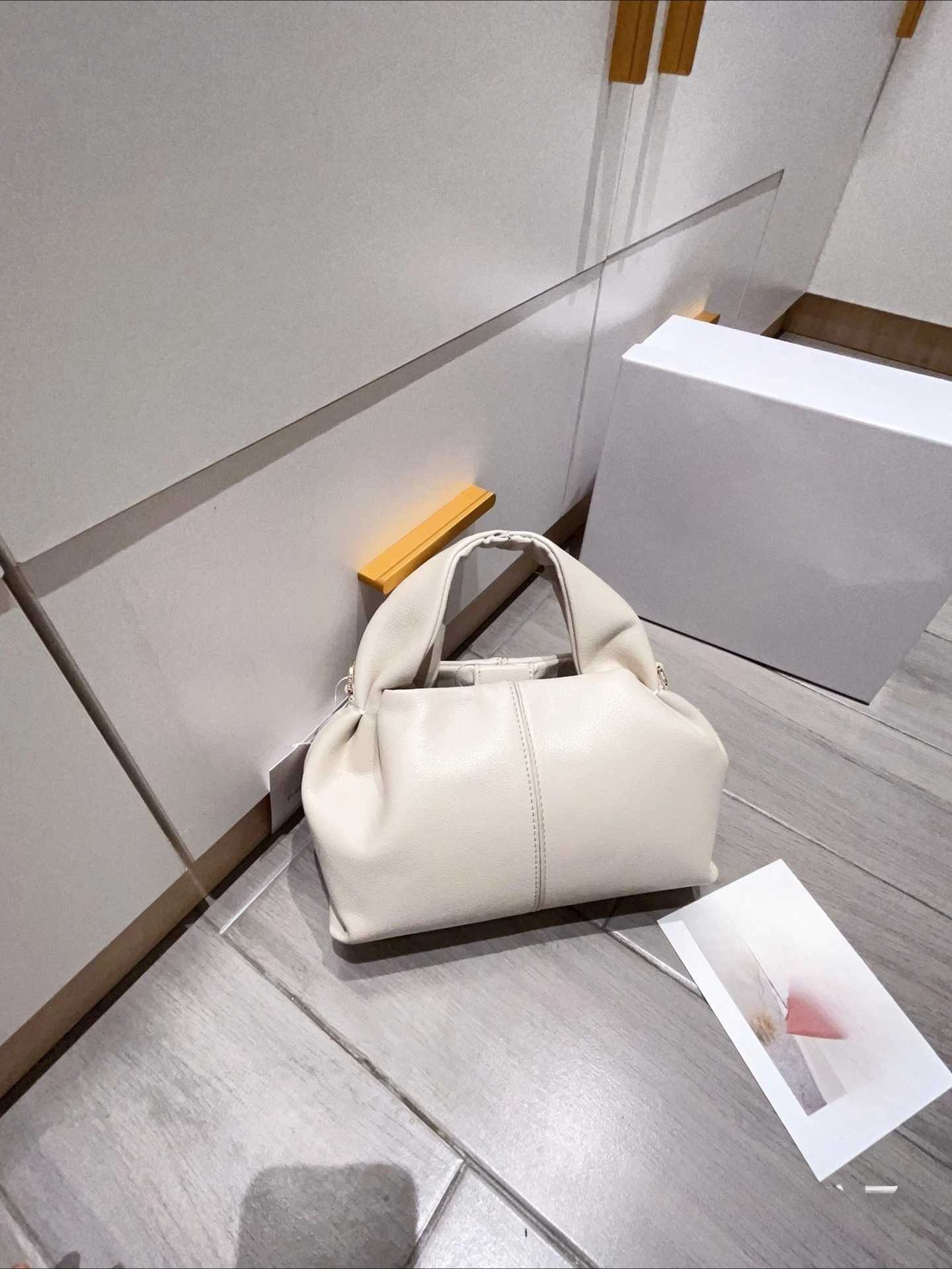 2025 New high-end retro womens must-have fashionable dumpling bag underarm hand-held crossbody bag Y250730