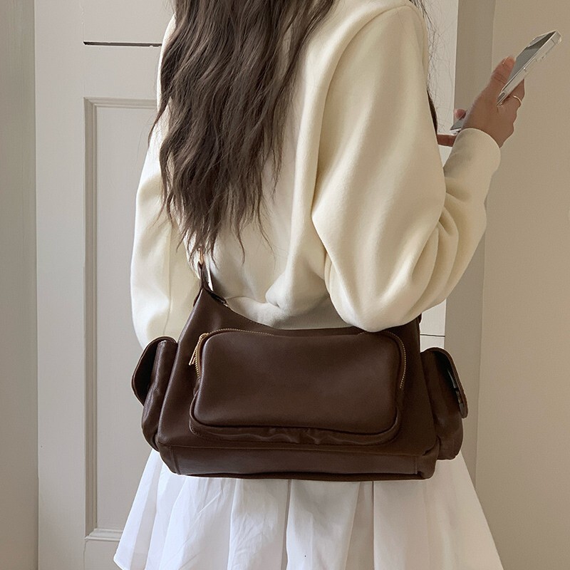 Designer Bag 2025 New Luxury Bag Korean INS Style Niche Black Retro Commuter Underarm Bag Single Shoulder Crossbody Punk Motorcycle Bag tote bag