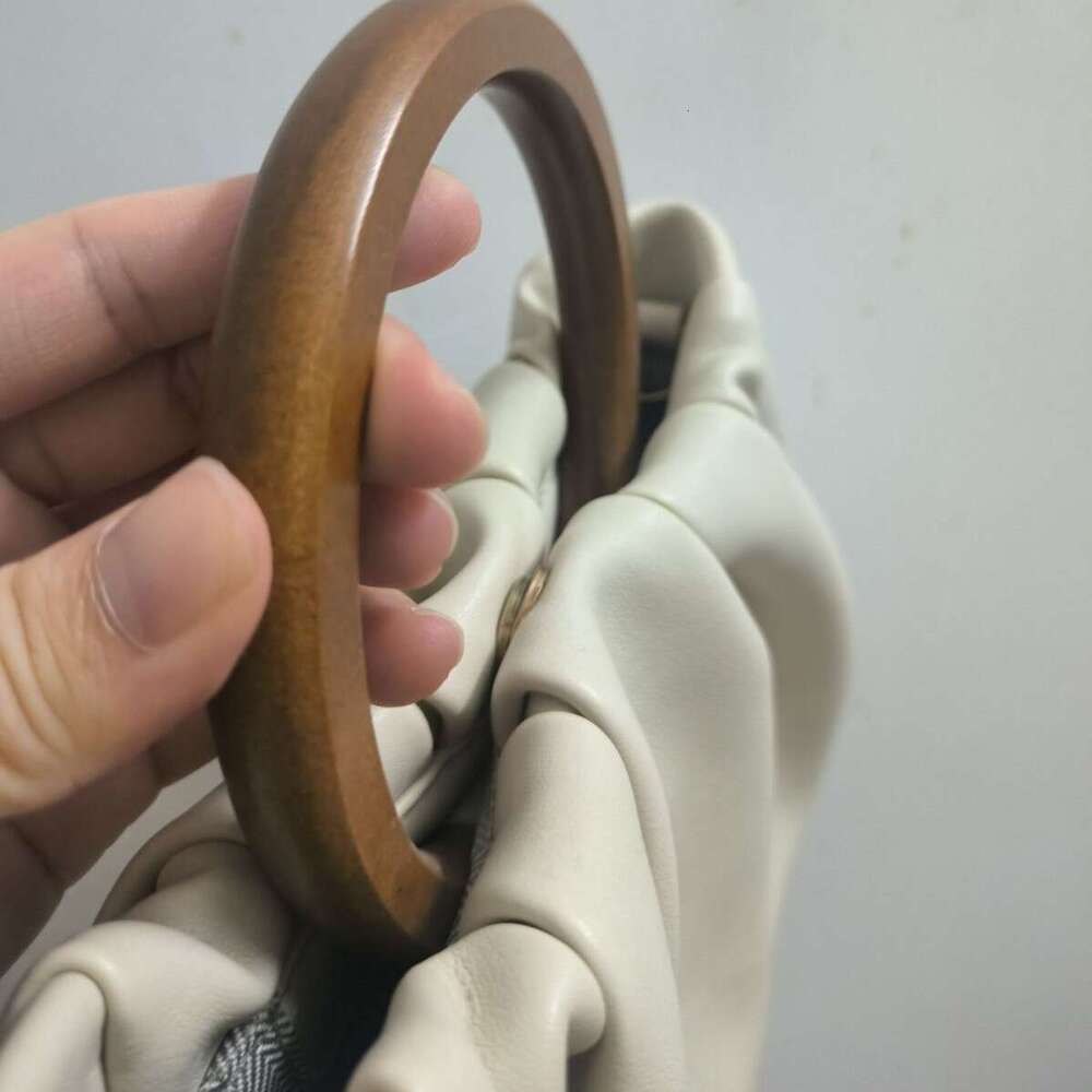 Niche Design Wooden Handle Wrinkled Cloud Handbag for Women 2025 New Ins Style Crossbody Mini Bag Trendy