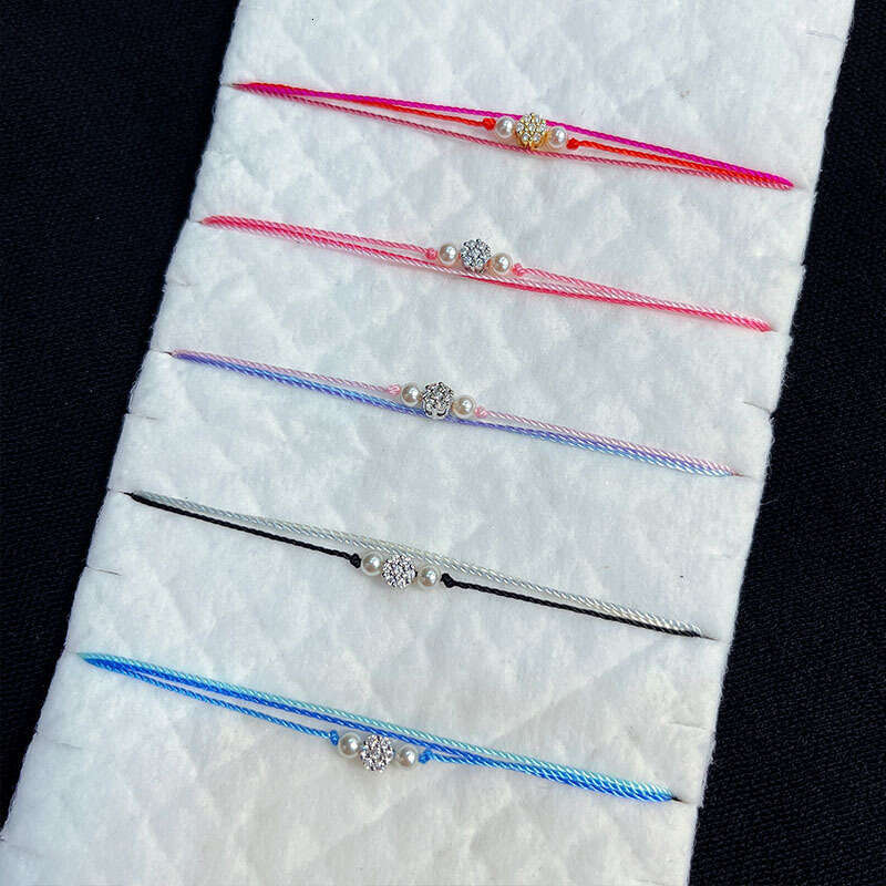French Paris Fashion New Pearl Small Flower Inlaid Dia Three-Layer Woven Women's Bracelet Zodiac Year Lucky Trend