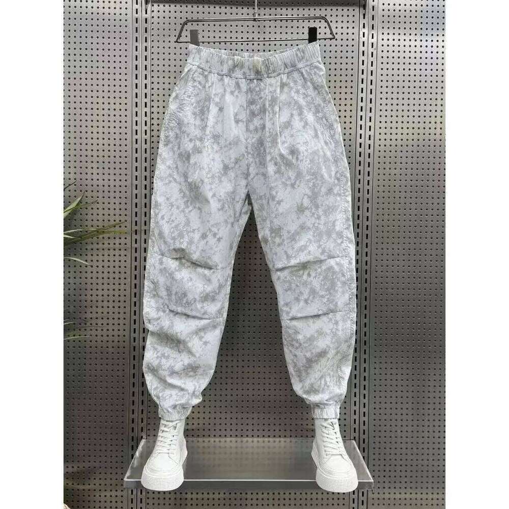 Trendy brand fashion Spring and Autumn Men's Elastic waist Printing pocket Drawstring Chinese style Versatile Loose Haren pants