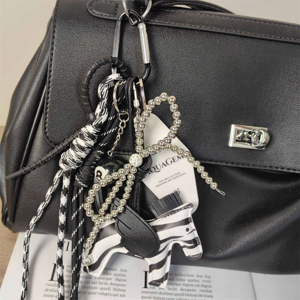 Black and White Zebra PU Leather Little Pegasus Silver Pearl Bow Keychain Unisex Bag Pendant