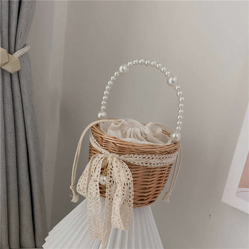 New Niche Design for Women 2023 Summer Trendy Woven Pearl Handheld Basket Bag