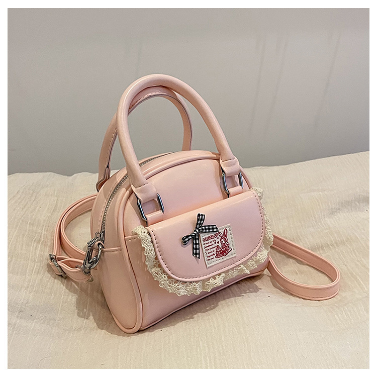 2025 Designer's New Cute Girl Design High end Boston Bag Women's Commuter Bag